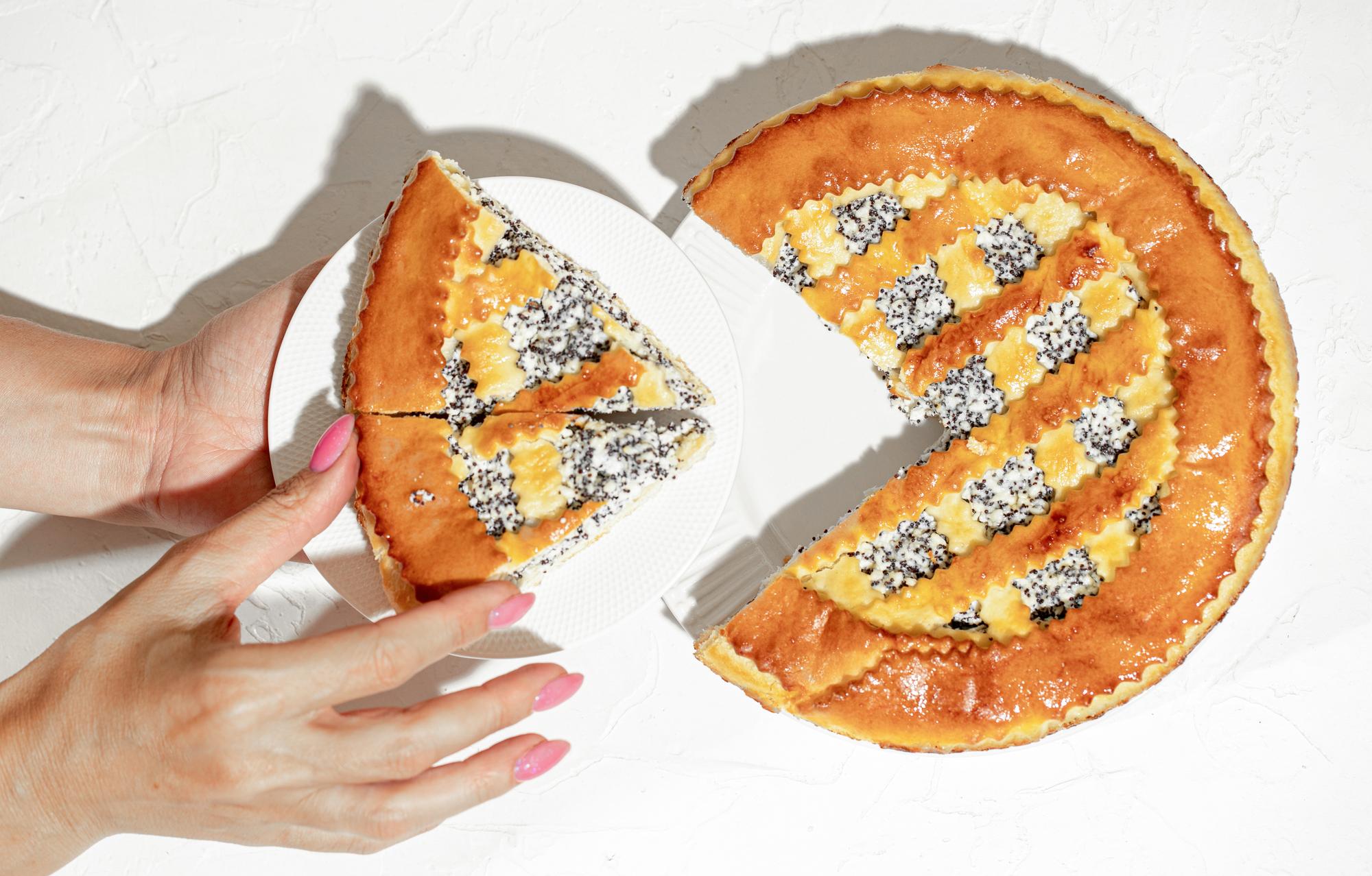 Close-up of flaky tart being sliced