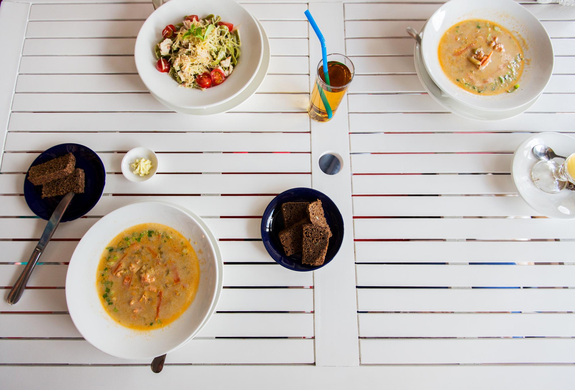 Overview of three meal plans laid out on table